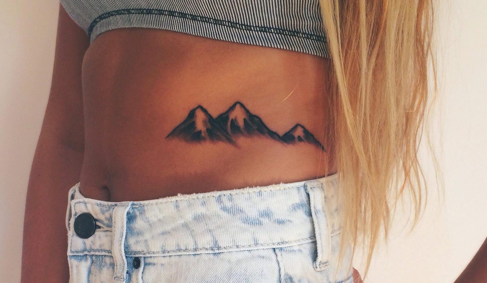 Women's Mountain Stomach Tattoo