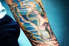 Broncos-and-City-Landscape-Forearm-Tattoo